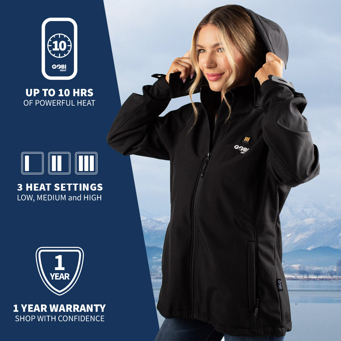 A woman wearing GOBI's women's Sahara II heated jacket. She is in front of a landscape, with information about the product on the left side of the image.