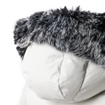 White puffer Kaya with a black and gray fur hood on a white background