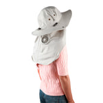 Breza Sun Hat in Sand - woman wearing sun hat outdoors lifestyle