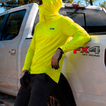 Man in a hi-vis yellow GOBI Helio UPF Sun Hoodie with hood and face cover up, leaning against a Ford FX4 Off Road pickup truck.