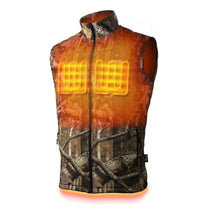 Colorado Men's Heated Hunting Vest in the Mossy Oak Breakup colorway, with the heat zones highlighted on the chest.